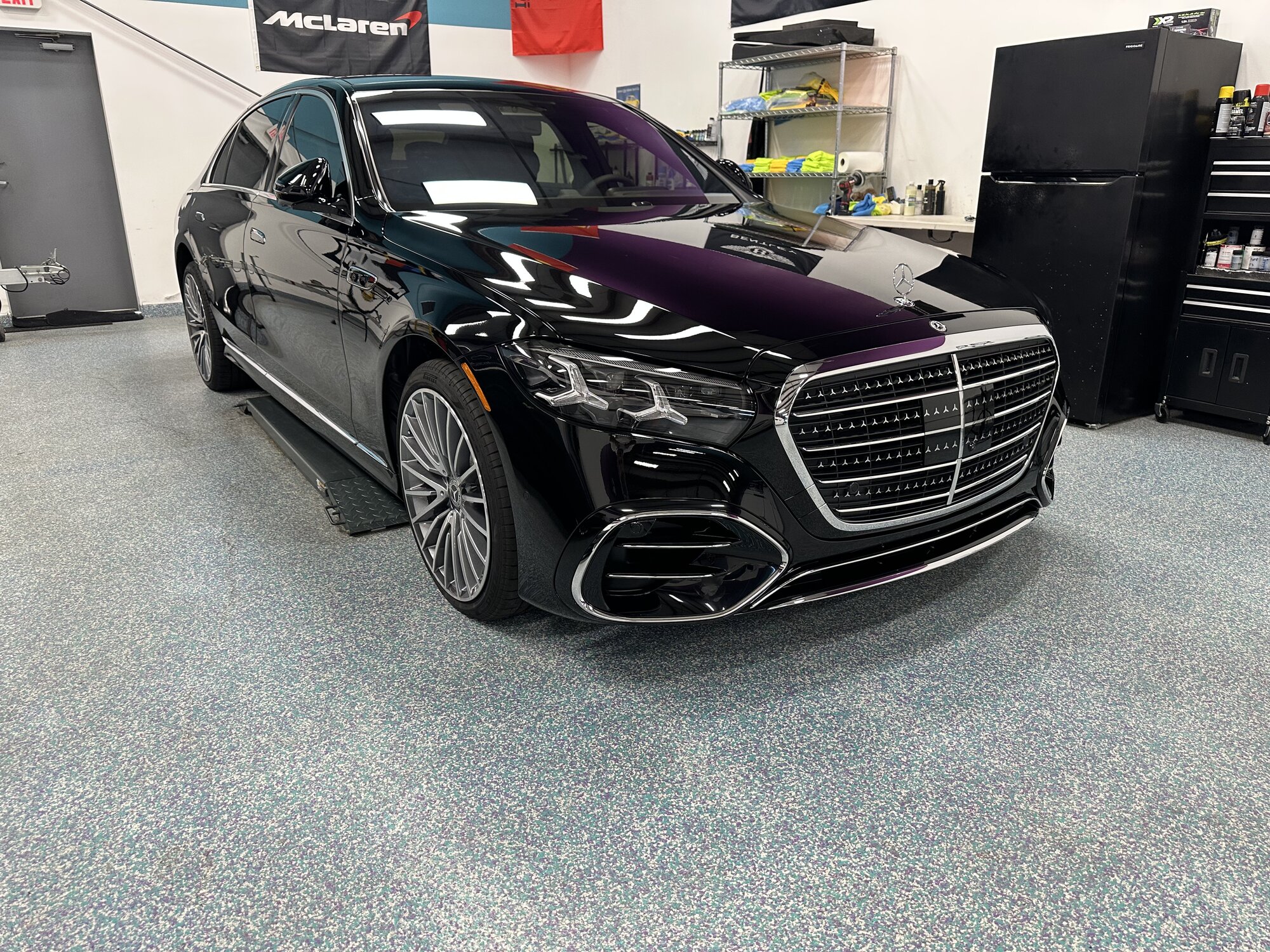 Black Mercedes S-Class in the Palm Beach Ceramics shop